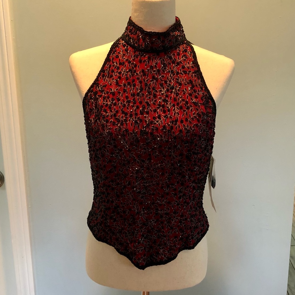 Beaded and silk halter top. Size medium with back zip & high collar. Never worn